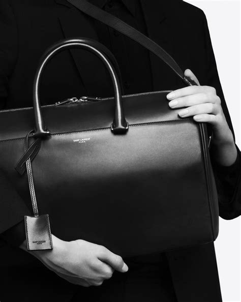 ysl duffle 12 bag|YSL black and white bag.